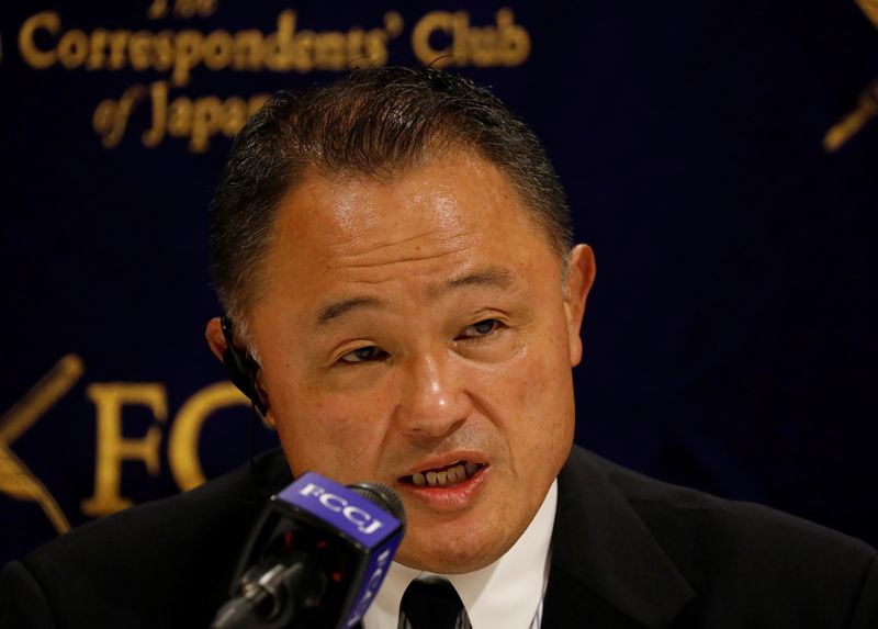 Japanese Olympic Committee President Yasuhiro Yamashita attends a news conference in Tokyo