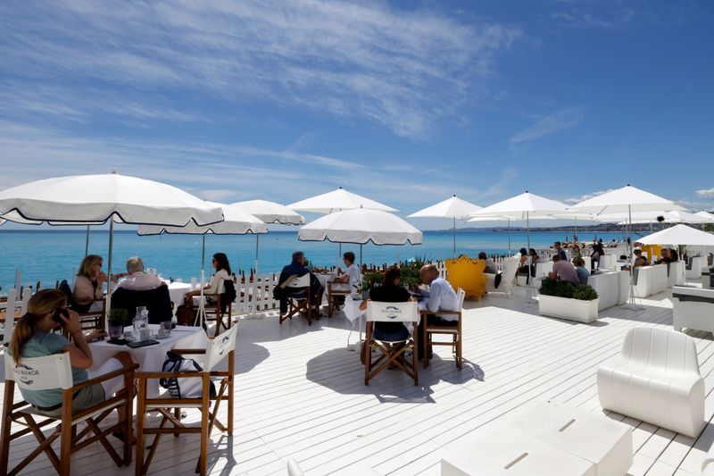 FILE PHOTO: Restaurants welcome customers onto terraces in Nice as France lifts more restrictions