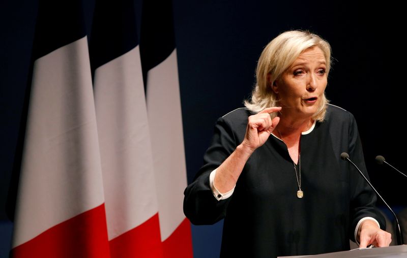 FILE PHOTO: France's far-right leader Marine Le Pen delivers a speech for the next year's municipal elections in an end-summer annual address to partisans in Frejus