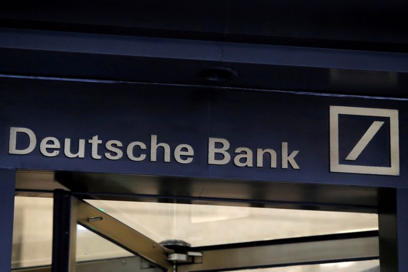 FILE PHOTO: Signage is seen on the lobby of the U.S. headquarters of Deutsche Bank in New York City