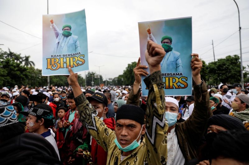 Protest supporting Rizieq Shihab, an Indonesian Islamic cleric who is sentenced for breaching COVID-19 curbs after his return last year from self-imposed exile, in Jakarta