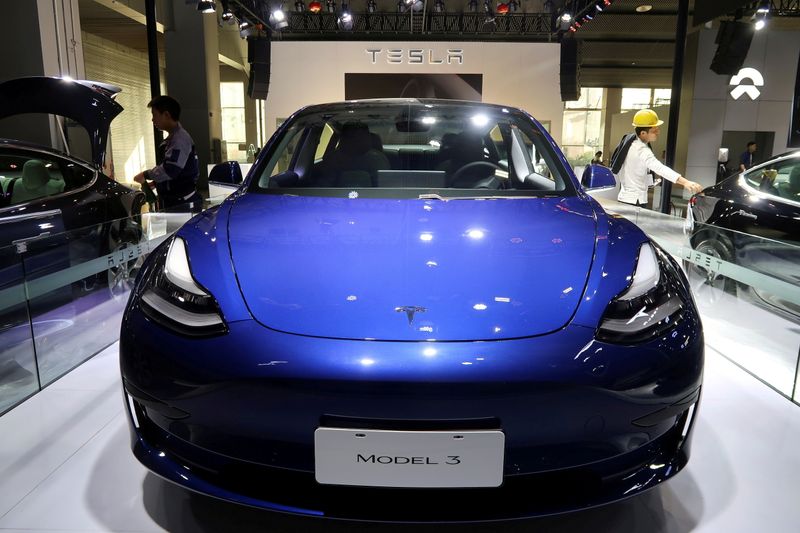 FILE PHOTO: A China-made Tesla Model 3 electric vehicle is seen ahead of the Guangzhou auto show