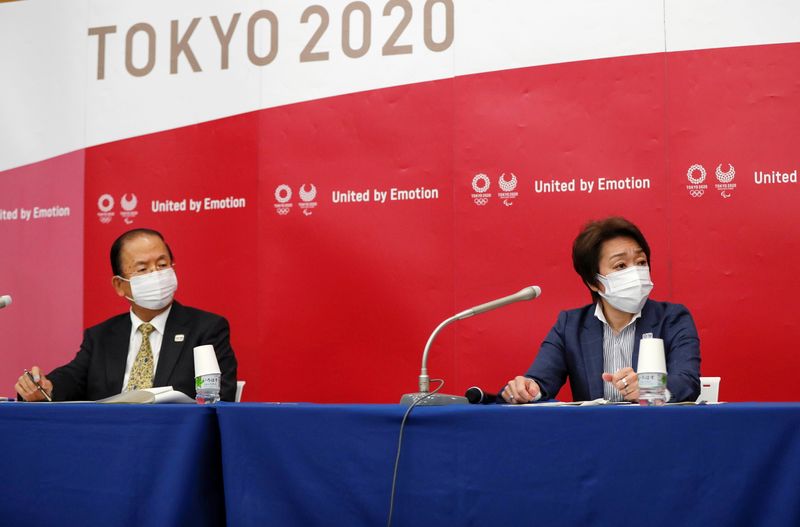 Tokyo 2020 Olympics Organising Committee President Seiko Hashimoto and CEO Toshiro Muto attend a news conference in Tokyo