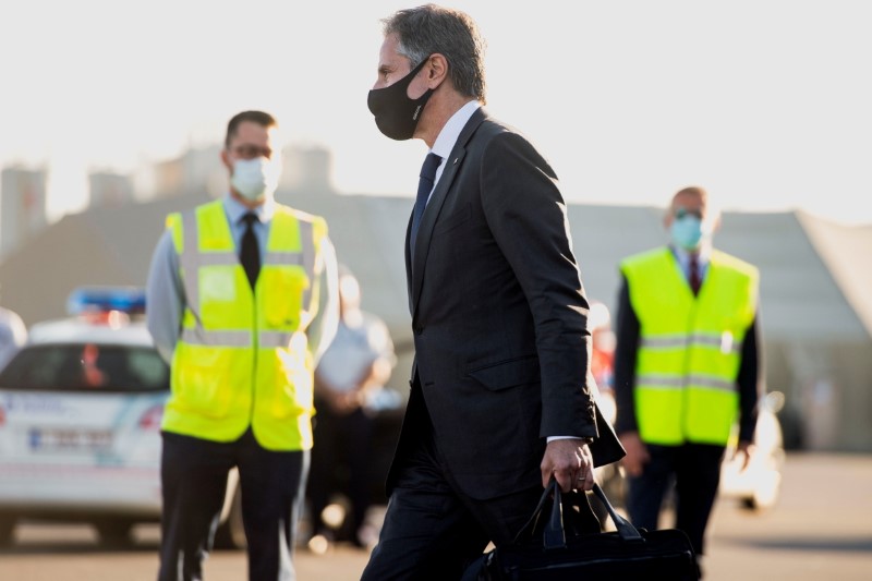 U.S. Secretary of State Antony Blinken walks to his car after disembarking from his airplane upon arrival ahead of the NATO Summit at Brussels Airport in Belgium