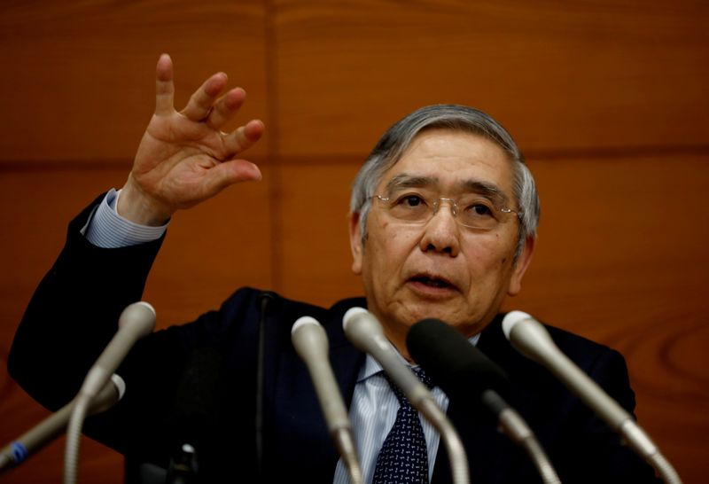 FILE PHOTO: Bank of Japan Governor Haruhiko Kuroda speaks at a news conference in Tokyo