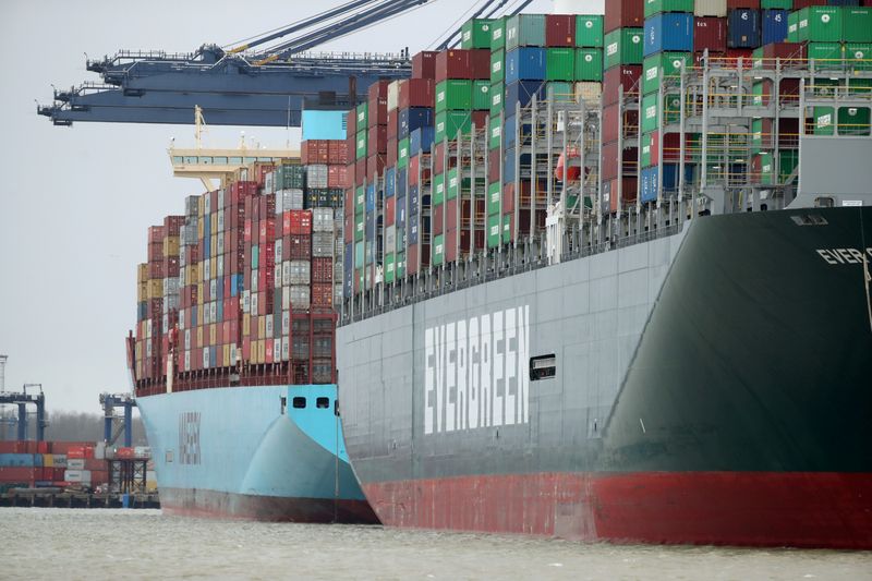 FILE PHOTO: A view of the Port of Felixstowe, as containers are seen aboard the container ship Ever Greet, in Felixstowe