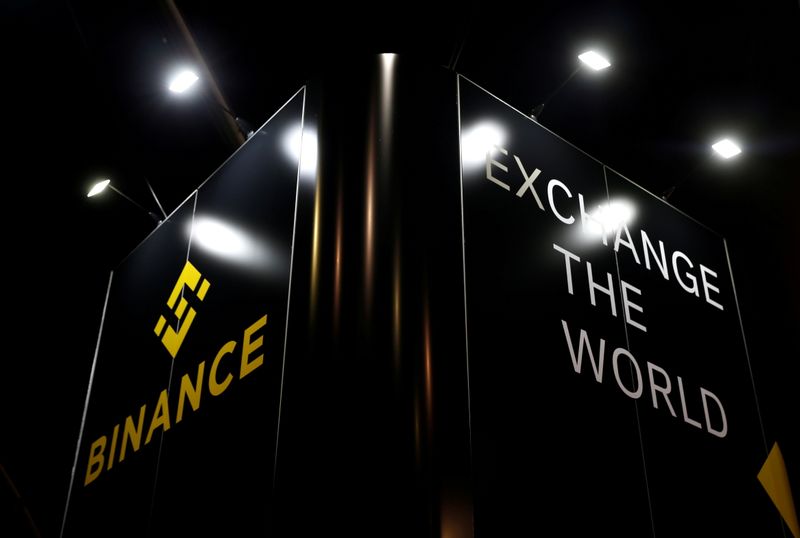 FILE PHOTO: The logo of Binance is seen on their exhibition stand at the Delta Summit, Malta's official Blockchain and Digital Innovation event promoting cryptocurrency, in Ta' Qali