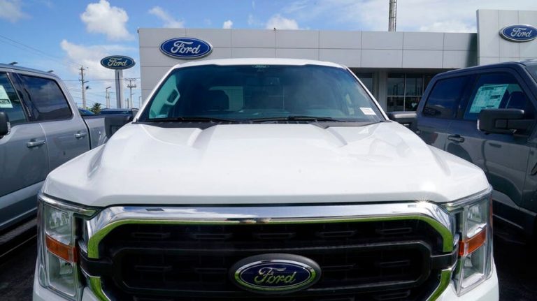 Ford cruises by chip shortage, boosts outlook