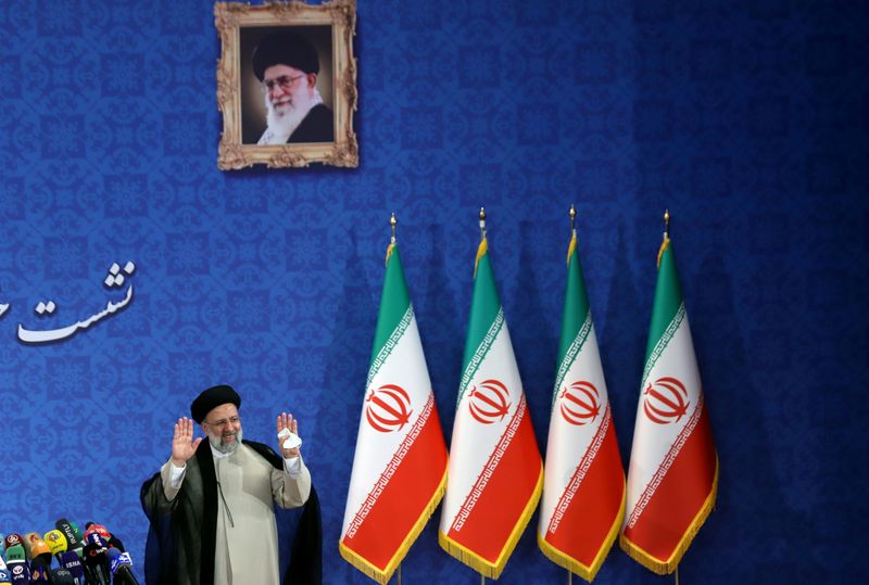 FILE PHOTO: Iran's President-elect Ebrahim Raisi gestures at a news conference in Tehran