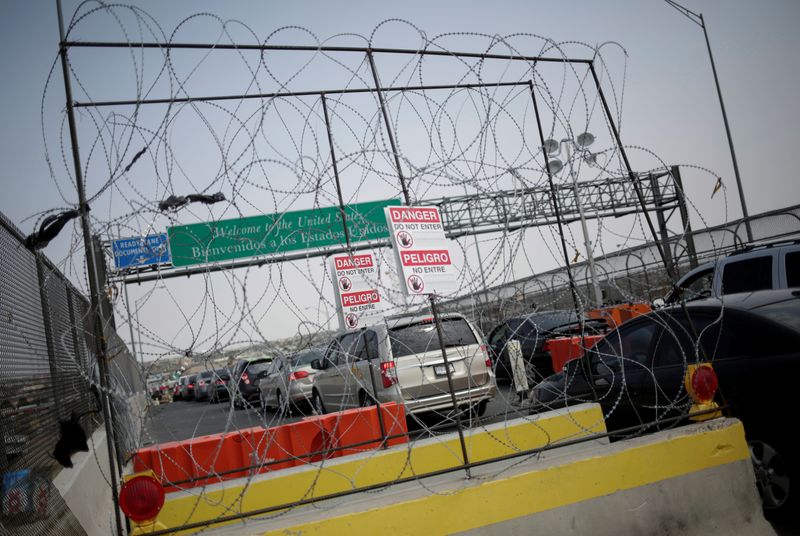 FILE PHOTO: Cars stand in line at the Cordova International Bridge at the Mexico-U.S. border to enter into El Paso, Texas, in Ciudad Juarez
