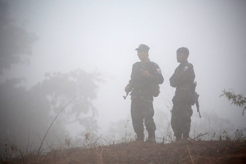 FILE PHOTO: Soldiers of Karen National Union (KNU) stand guard during the 70th anniversary of Karen National Revolution Day in Kaw Thoo Lei