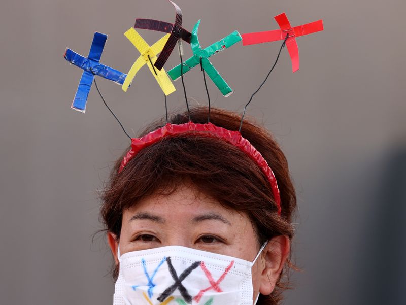 People protest against the Tokyo 2020 Olympic Games