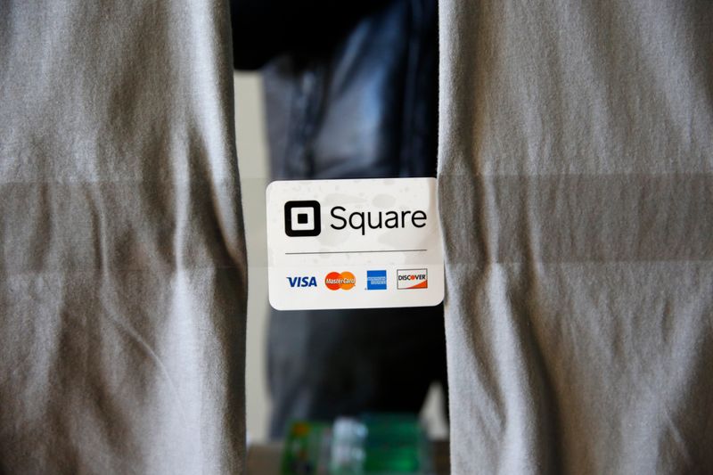 FILE PHOTO: An advertisement for the Square payment processor is seen outside a vendors site along the High Line in New York