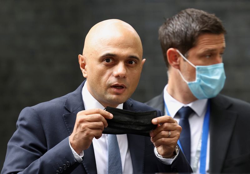 FILE PHOTO: Britain's new Health Secretary Sajid Javid leaves the Downing Street in London