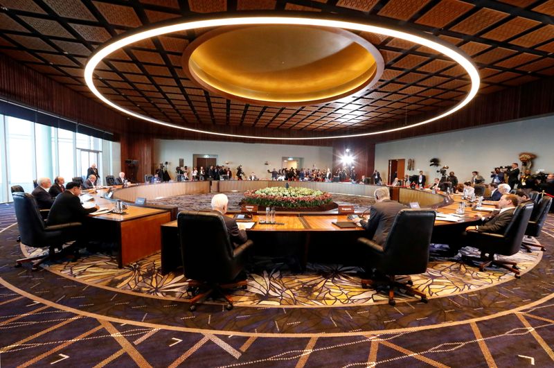 FILE PHOTO: Leaders attend the retreat session of the APEC Summit in Port Moresby, Papua New Guinea