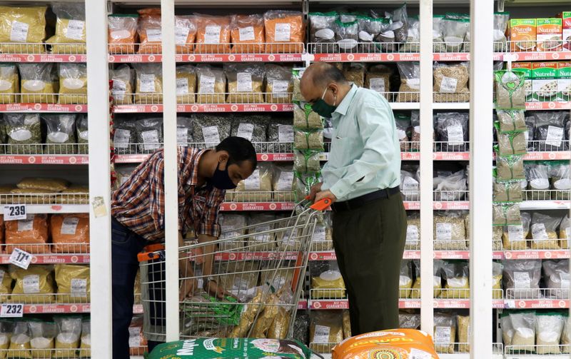 People shop at the Big Bazaar retail store in Mumbai