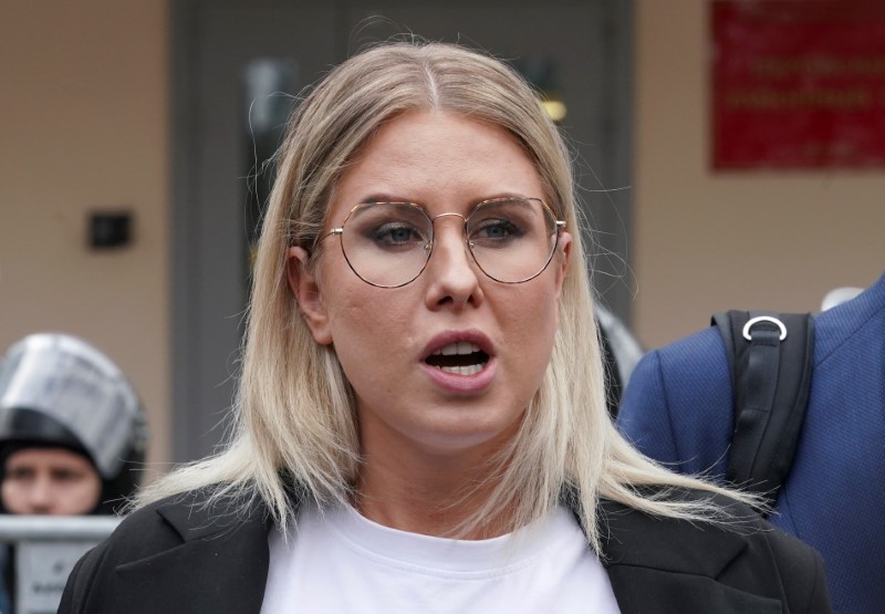 Russian opposition figure Lyubov Sobol speaks with journalists after a court hearing in Moscow