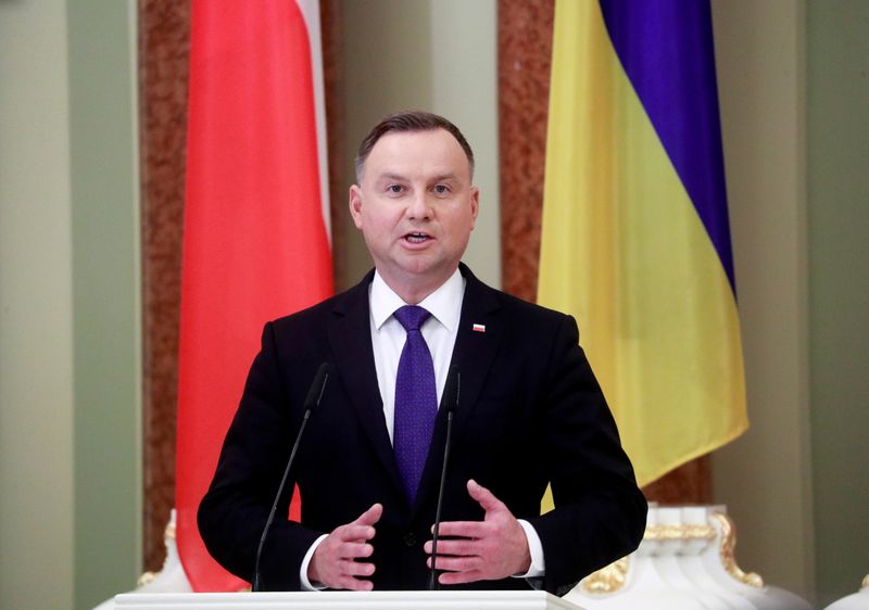 FILE PHOTO: Polish President Andrzej Duda speaks during a news briefing in Kyiv, Ukraine