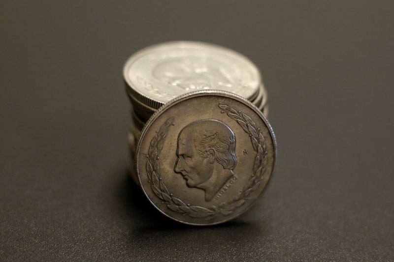 Mexican 5 Pesos Hidalgo silver coins are displayed at currency exchange shop in Ciudad Juarez