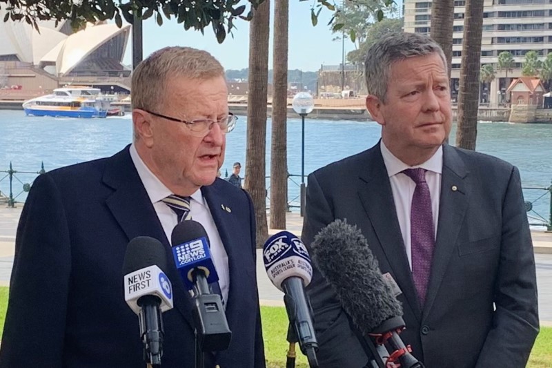 International Olympic Committee Vice President John Coates and Australian Olympic Committee Chief Executive Matt Carroll hold a news conference at Sydney harbour