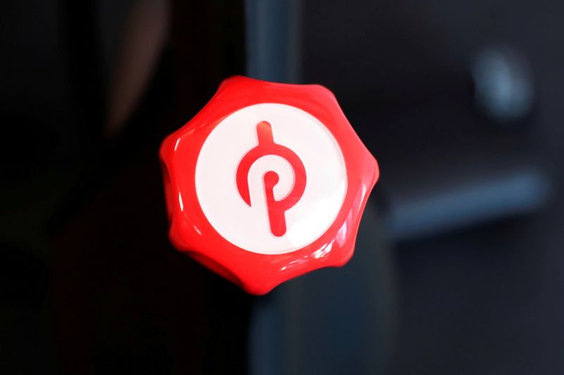 FILE PHOTO: A Peloton logo is seen on an exercise bike after the ringing of the opening bell for the company's IPO at the Nasdaq Market site in New York City