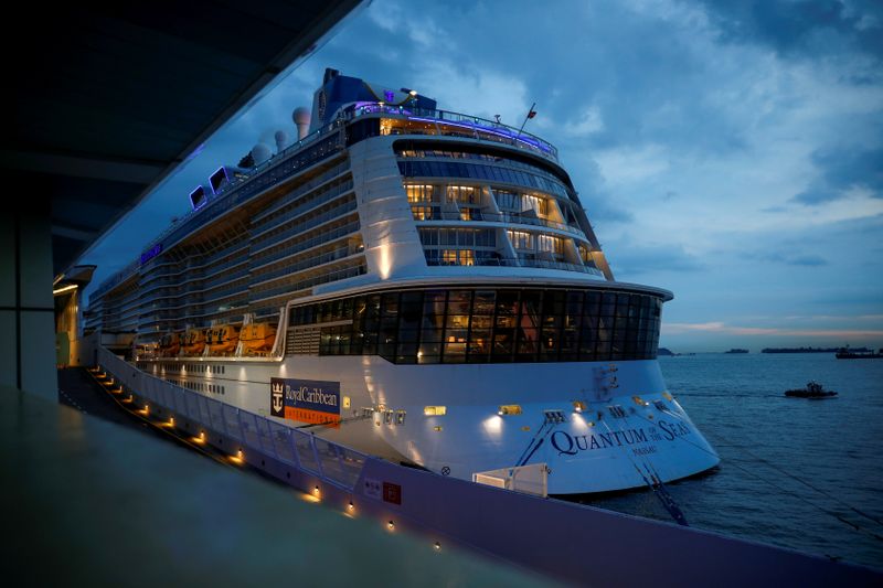 FILE PHOTO: Royal Caribbean's Quantum of the Seas cruise ship docks at Marina Bay Cruise Center after a passenger tested positive for COVID-19 during a cruise to nowhere