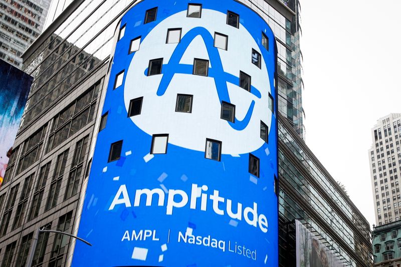 A screen announces Amplitude’s direct listing outside the Nasdaq Market in Times Square during in New York