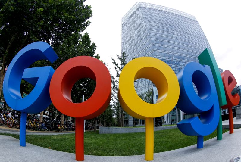 FILE PHOTO: The brand logo of Alphabet Inc's Google is seen outside its office in Beijing, China