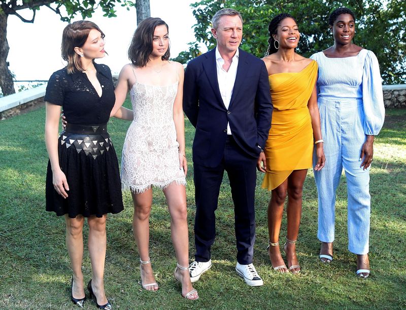 FILE PHOTO: Actors Lea Seydoux, Ana de Armas, Daniel Craig, Naomie Harris and Lashana Lynch pose for a picture during a photocall for the British spy franchise's 25th film set for release next year, titled 