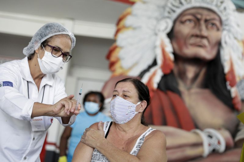 FILE PHOTO: COVID-19 vaccinations at Cacique de Ramos, Rio de Janeiro