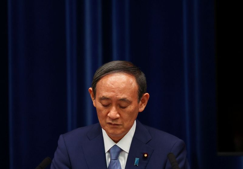 FILE PHOTO : Japan's Prime Minister Yoshihide Suga attends a news conference on Japan's response to the coronavirus disease (COVID-19) outbreak, in Tokyo