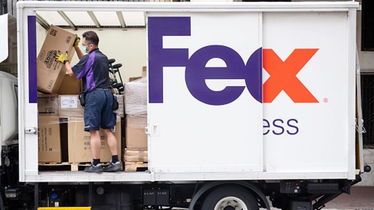 FedEx say staffing problems crimped earnings in first quarter