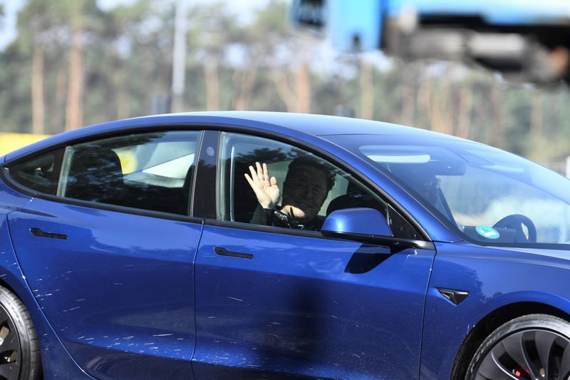 FILE PHOTO: Tesla CEO Musk arrives at the construction site of Tesla's Gigafactory in Gruenheide