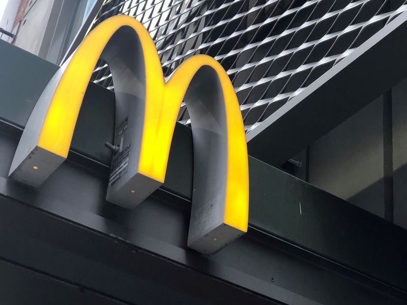 FILE PHOTO: The McDonald's logo is seen outside the fast-food chain McDonald's in New York