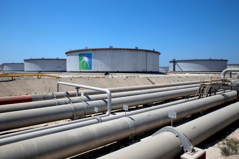 FILE PHOTO: General view of Aramco tanks and oil pipe at Saudi Aramco's Ras Tanura oil refinery and oil terminal