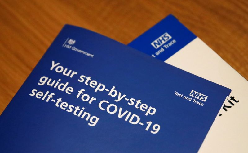 FILE PHOTO: A COVID-19 self-test kit is used by a teacher in Milton Keynes