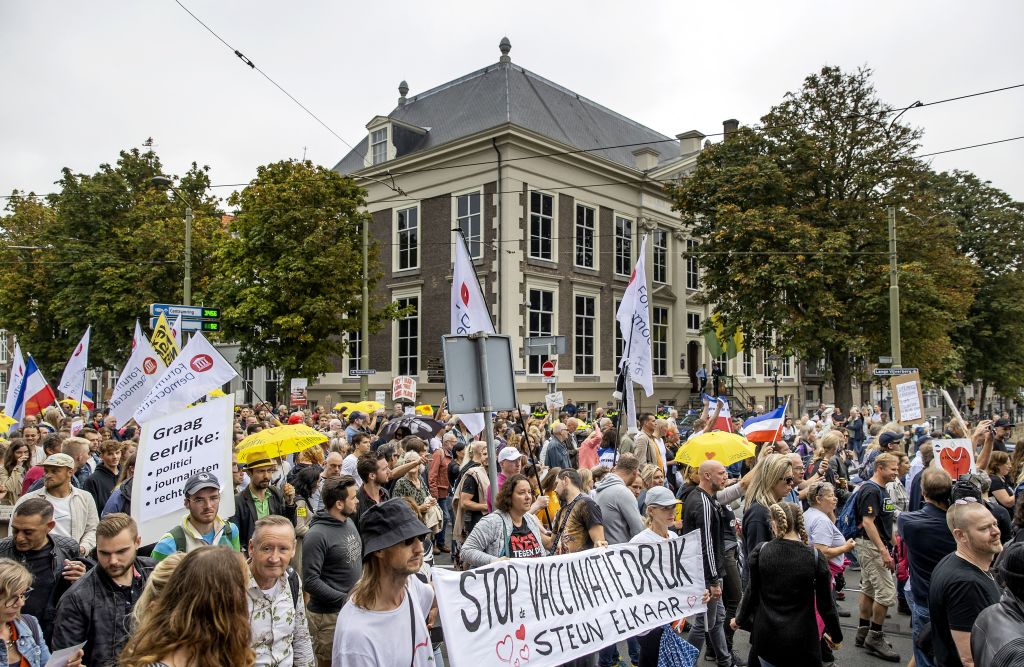 Opponents of the Covid-19 health pass demonstrate in The Hague, on September 25, 2021. - The march against the Covid-19 health pass is organized by, among others, the organisation Netherlands in Revolt. - Netherlands OUT (Photo by Koen van Weel / ANP / AFP) / Netherlands OUT (Photo by KOEN VAN WEEL/ANP/AFP via Getty Images)