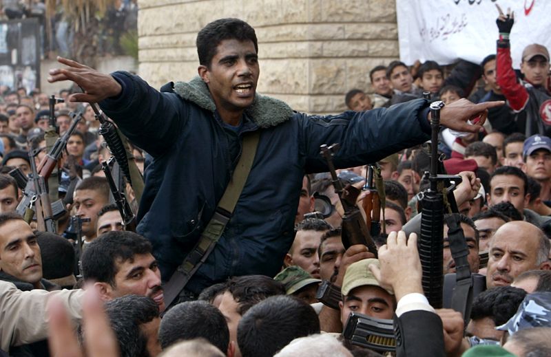 FILE PHOTO: Palestinian commander of the militant Al Aqsa Martyrs Brigades Zakaria Zubeid is carried on the shoulders of supporters in Jenin