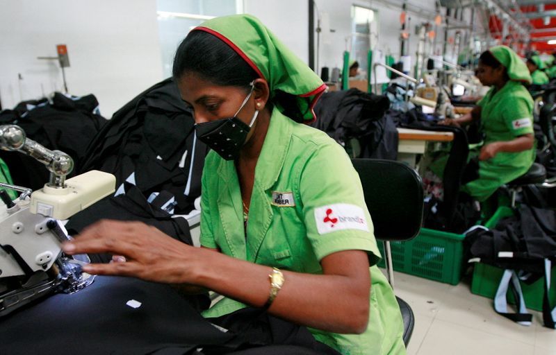 FILE PHOTO: File photo of garment workers sewing pants in a Brandix factory in Colombo