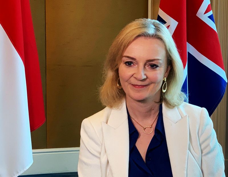 FILE PHOTO: British trade minister Liz Truss speaks to Reuters after signing a free trade agreement with Singapore, in Singapore