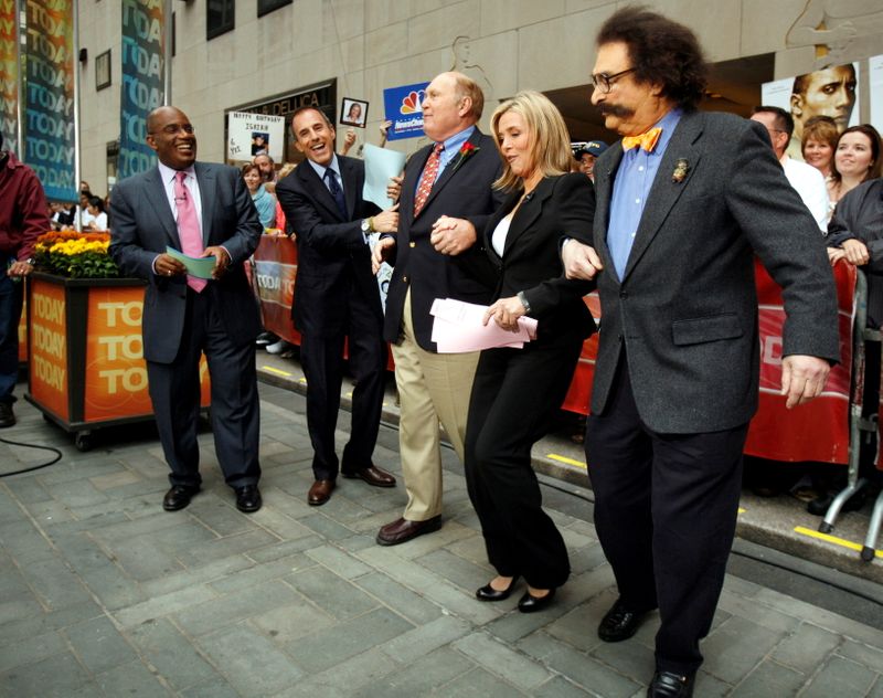 FILE PHOTO: Willard Scott and Gene Shalit dance with Meredith Vieira during her first day on NBC's 'Today' show in New York