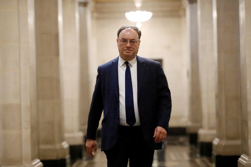 FILE PHOTO: Bank of England Governor Andrew Bailey poses for a photograph on the first day of his new role at the Central Bank in London