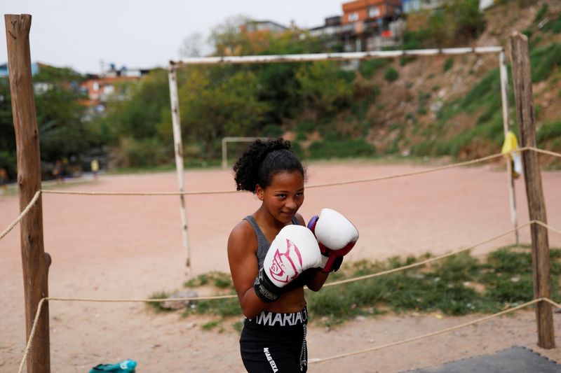 Dreaming of rings and medals: Boxing helps children in Sao Paulo favela