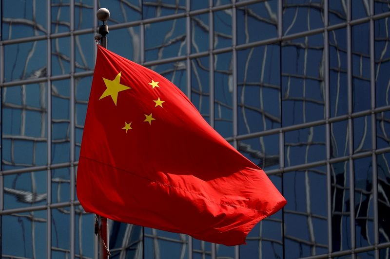FILE PHOTO: The Chinese national flag is seen in Beijing, China