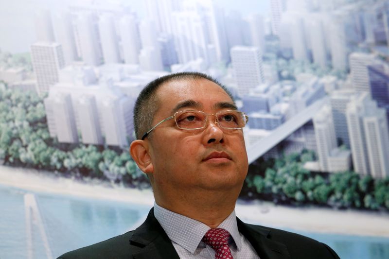 China Evergrande Group CEO Xia Haijun attends a news conference in Hong Kong