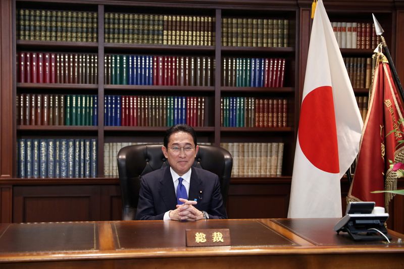 FILE PHOTO: Newly elected Japan's ruling Liberal Democratic Party (LDP) leader Fumio Kishida holds a news conference after the leadership election, in Tokyo