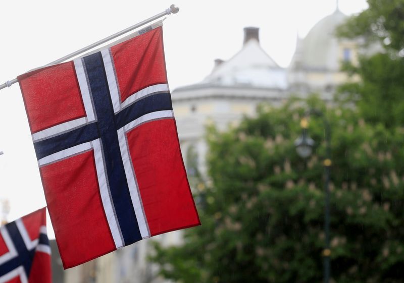 FILE PHOTO: Norwegian flags flutter at Karl Johans street in Oslo, Norway