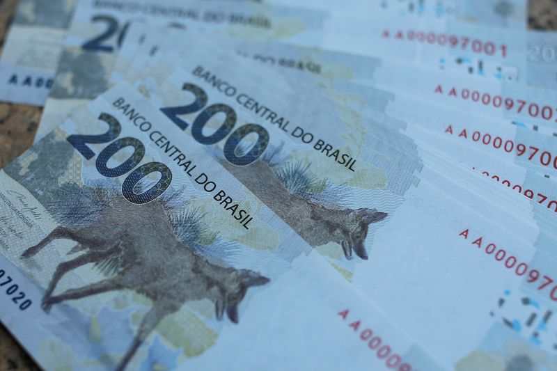 FILE PHOTO: 200 reais note are seen after Brazil's central bank issues the new note in Brasilia