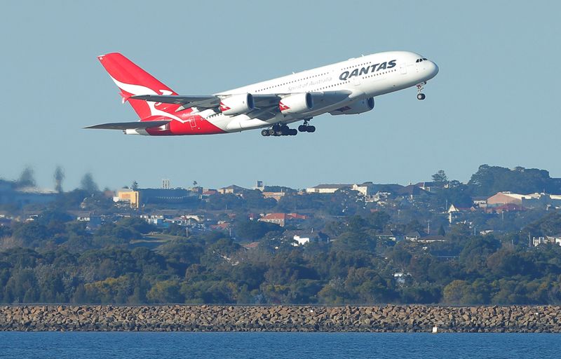 Qantas flight QF1, an Airbus A380 aircraft, takes off from Sydney International Airport en route to Dubai, above Botany Bay