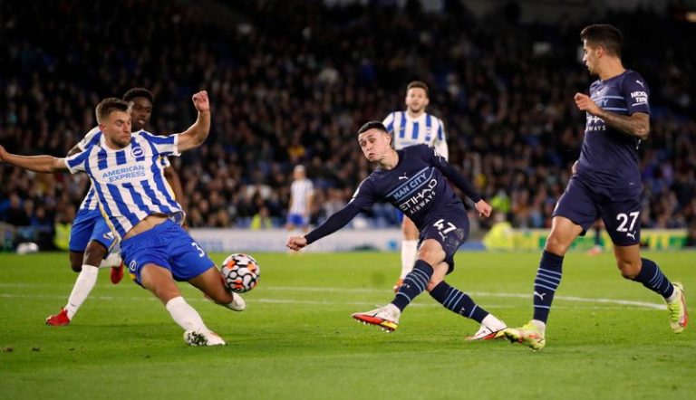 Soccer-Foden double inspires Man City to 4-1 win at Brighton